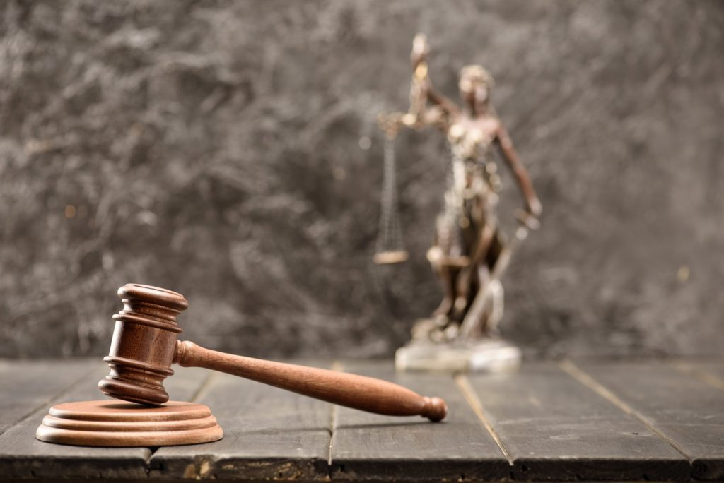 close-up-view-of-brown-mallet-of-judge-on-wooden-t-2024-11-19-10-16-51-utc-large