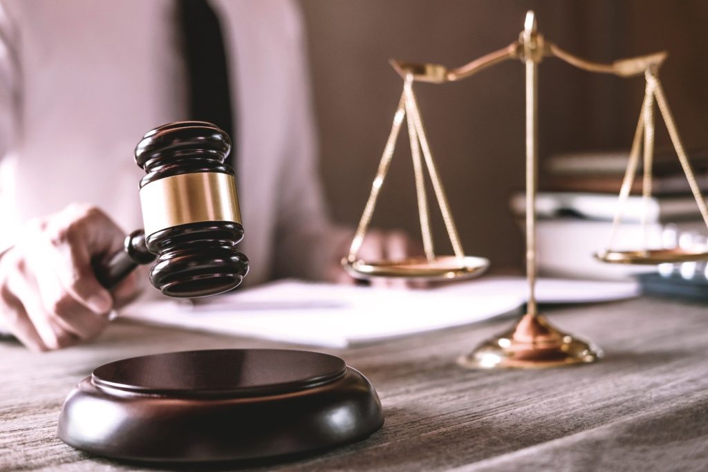 gavel-on-wooden-table-and-lawyer-or-judge-working-2025-01-09-05-29-20-utc-large